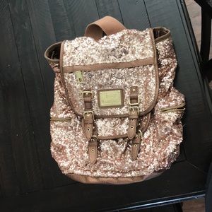 Rose gold backpack from juicy couture